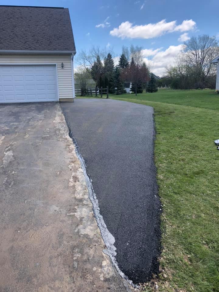 House Backyard Asphalt Installing — Northwood, OH — D & D Paving Inc.