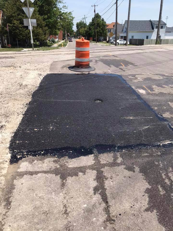 Residential House Backyard and Asphalt Installed — Northwood, OH — D & D Paving Inc.