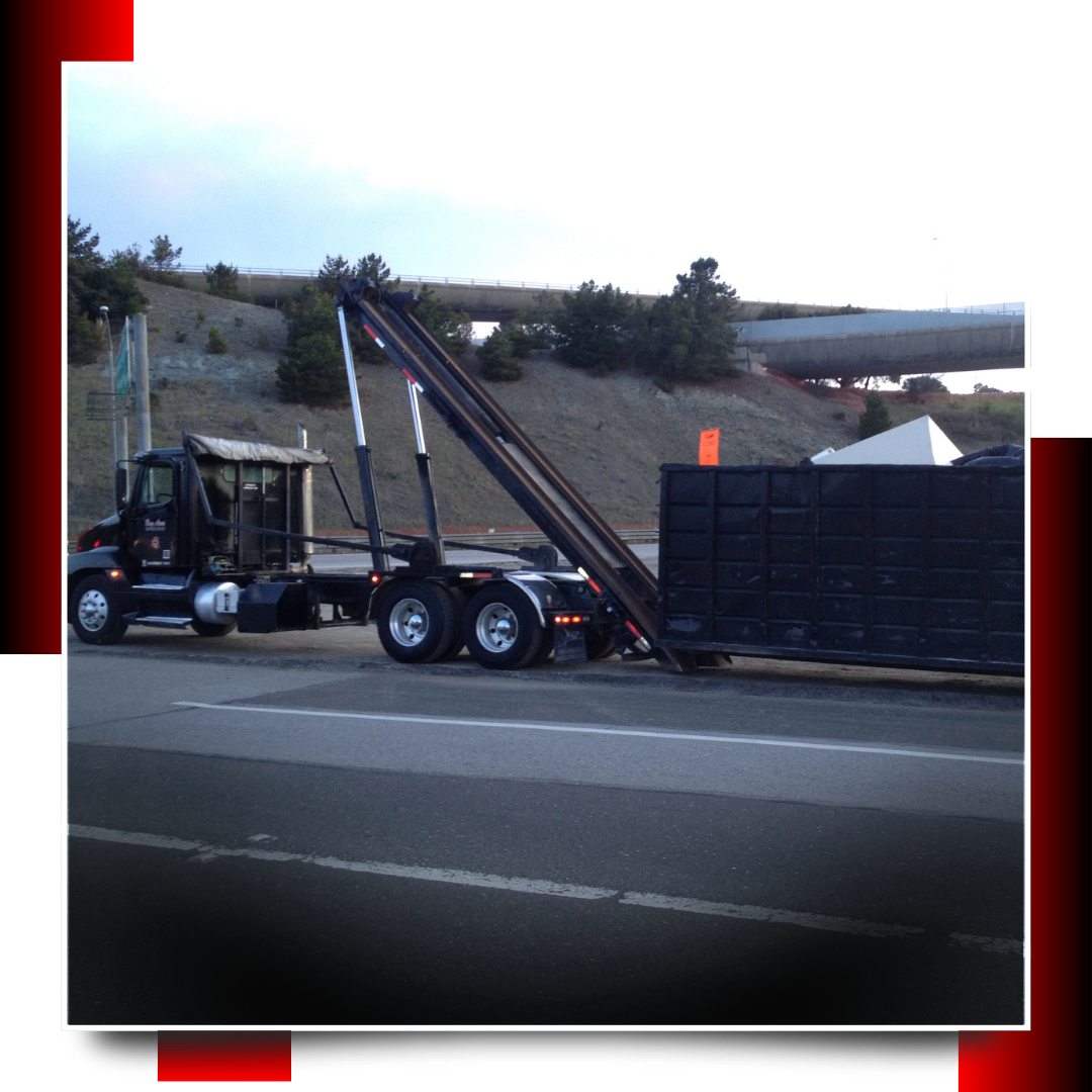 Dumpster truck parked on the road