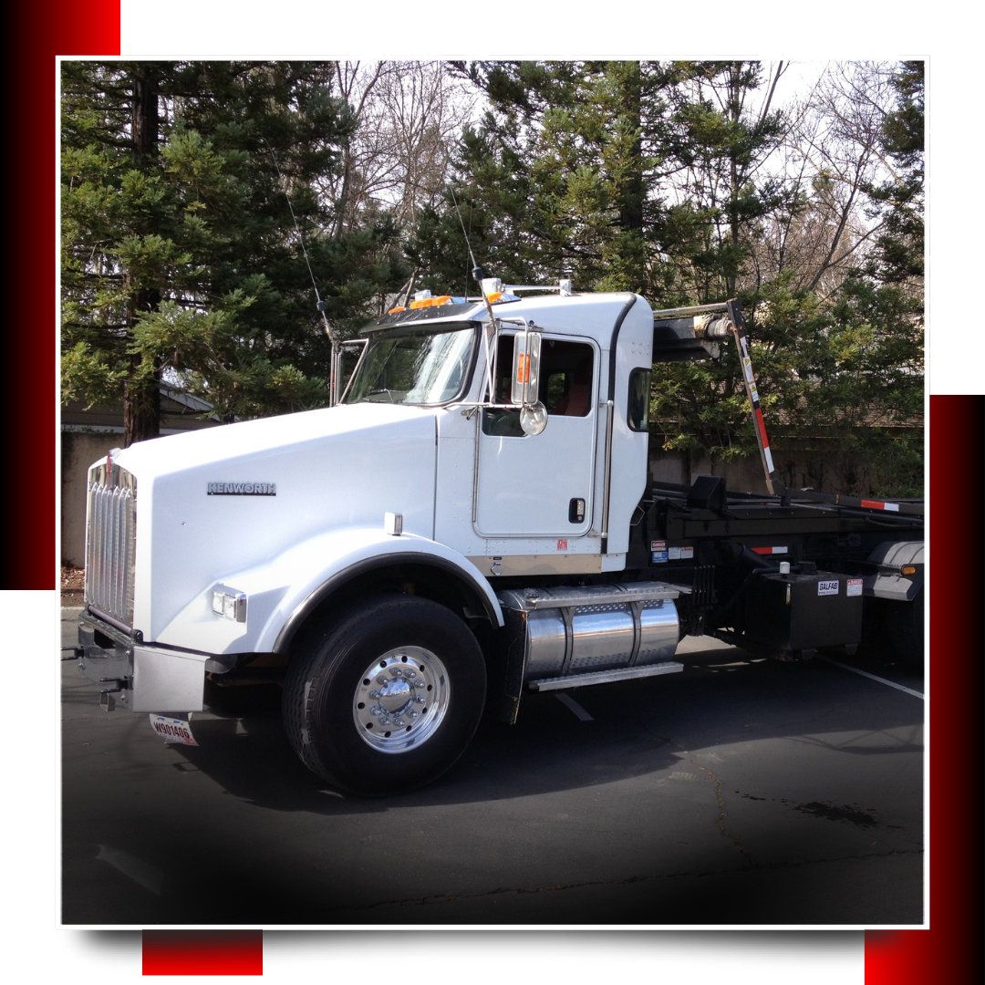 Dumpster truck parked on the road