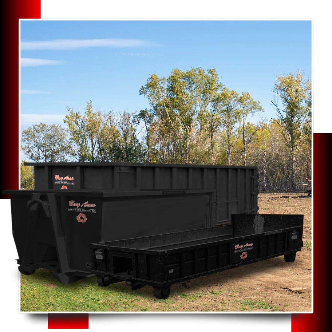 dumpsters with trees in the background