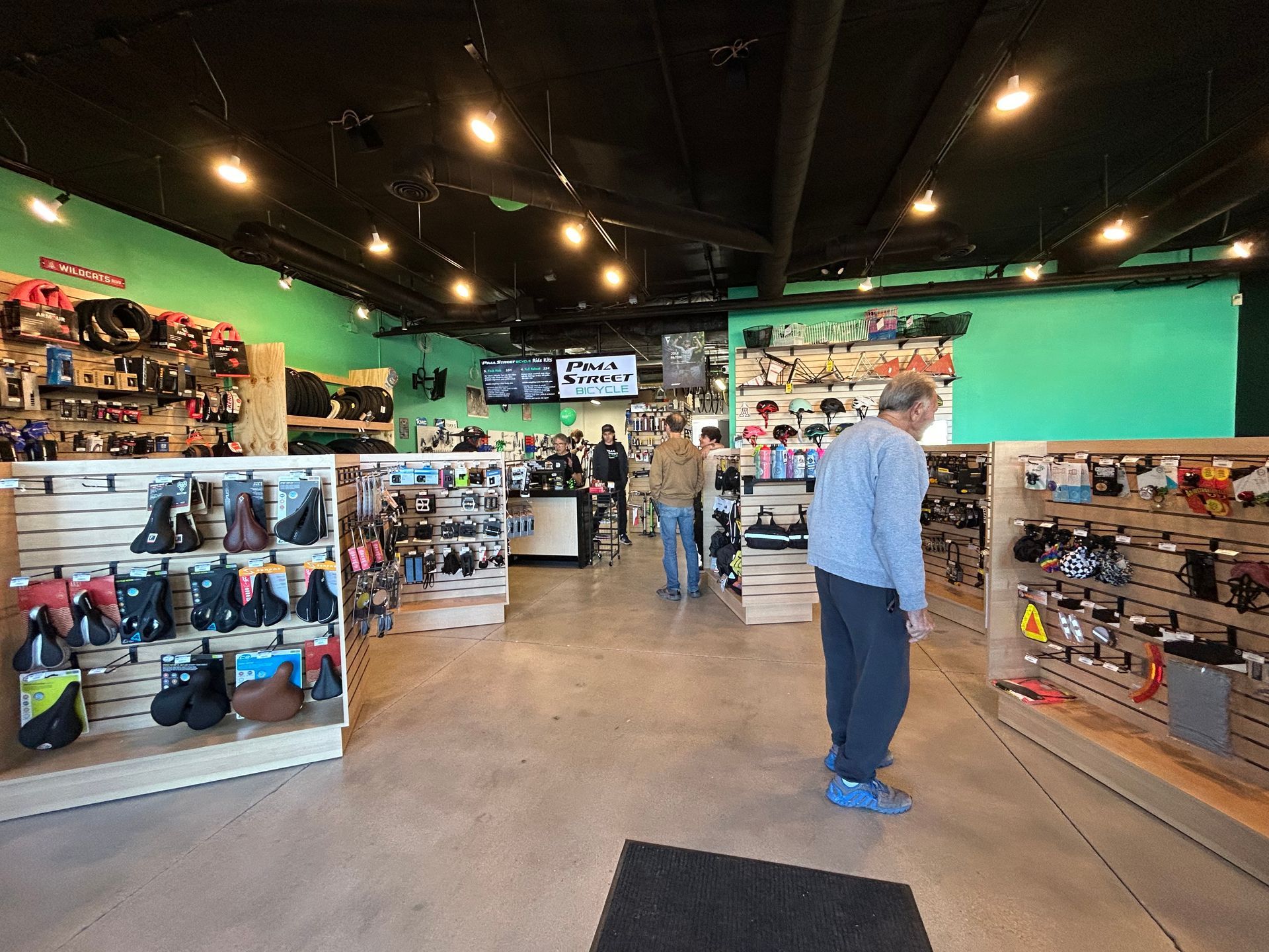 Poster inviting people to the Pima street bicycle shop grand re-opening, on December 6th, 2025.