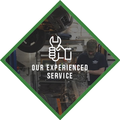 Green diamond graphic with mechanic in garage. Text: