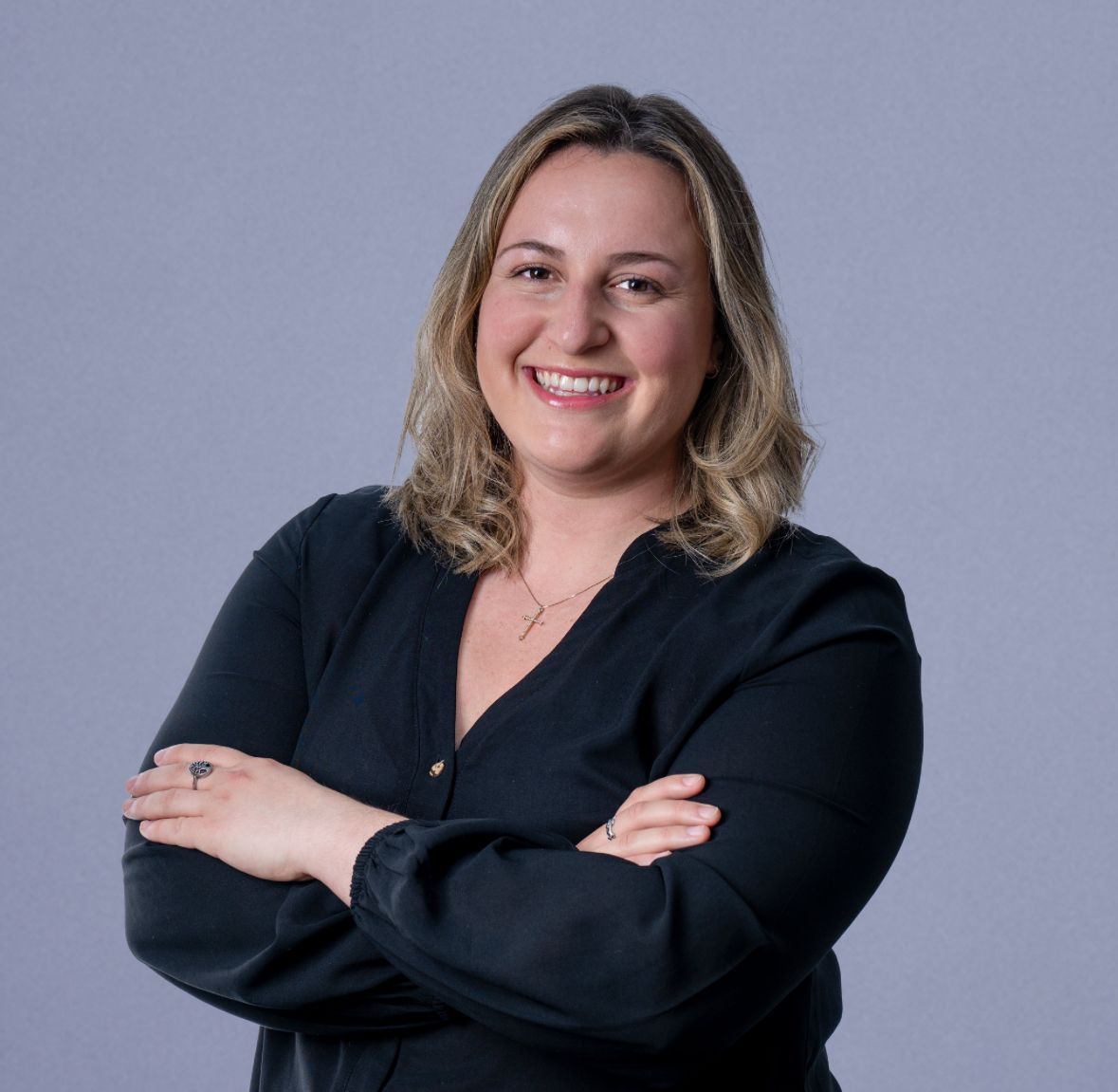 Woman in green jersey with