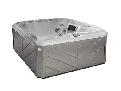 A gray rectangular hot tub with a light-colored interior and textured wood-look exterior, isolated on white.