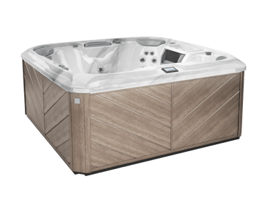 A rectangular hot tub with light wood-grain siding and a white interior, on a white background.