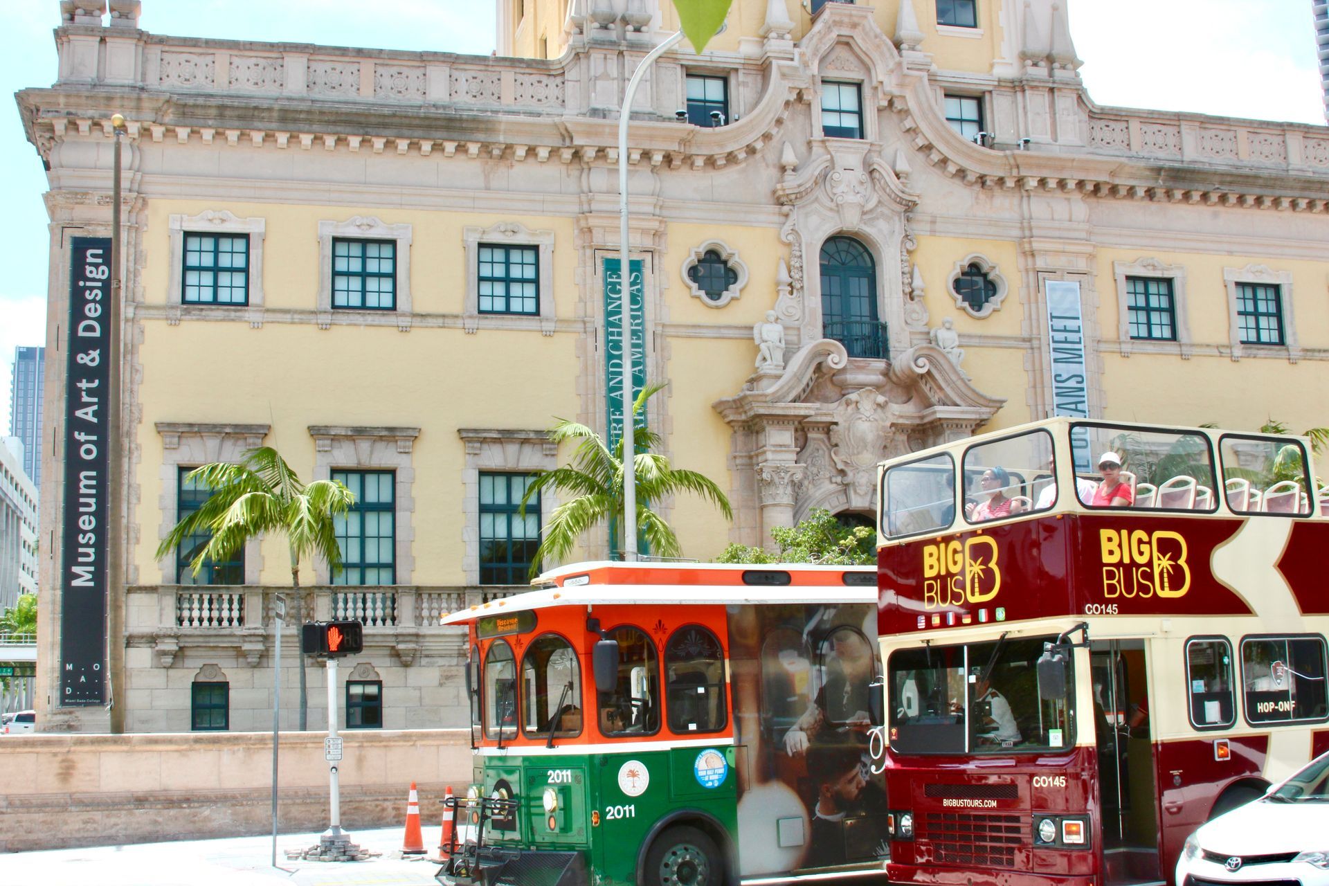 Museum of Art & Design with tour buses in front.