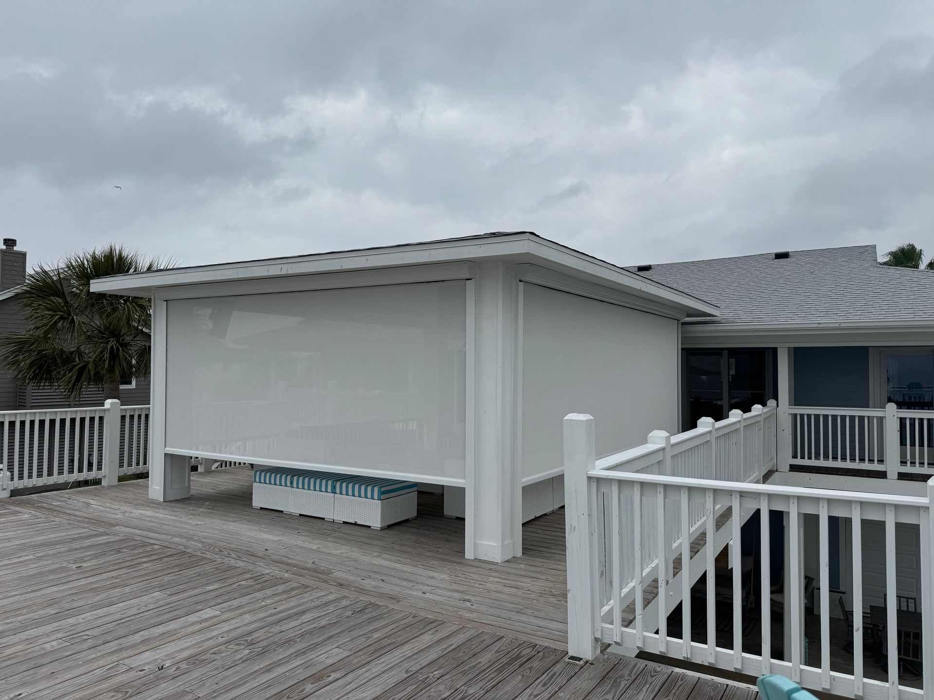 Motorized patio screen solution