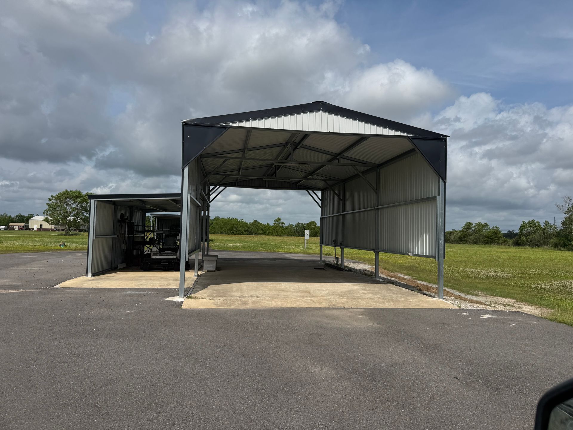 A large metal RV cover