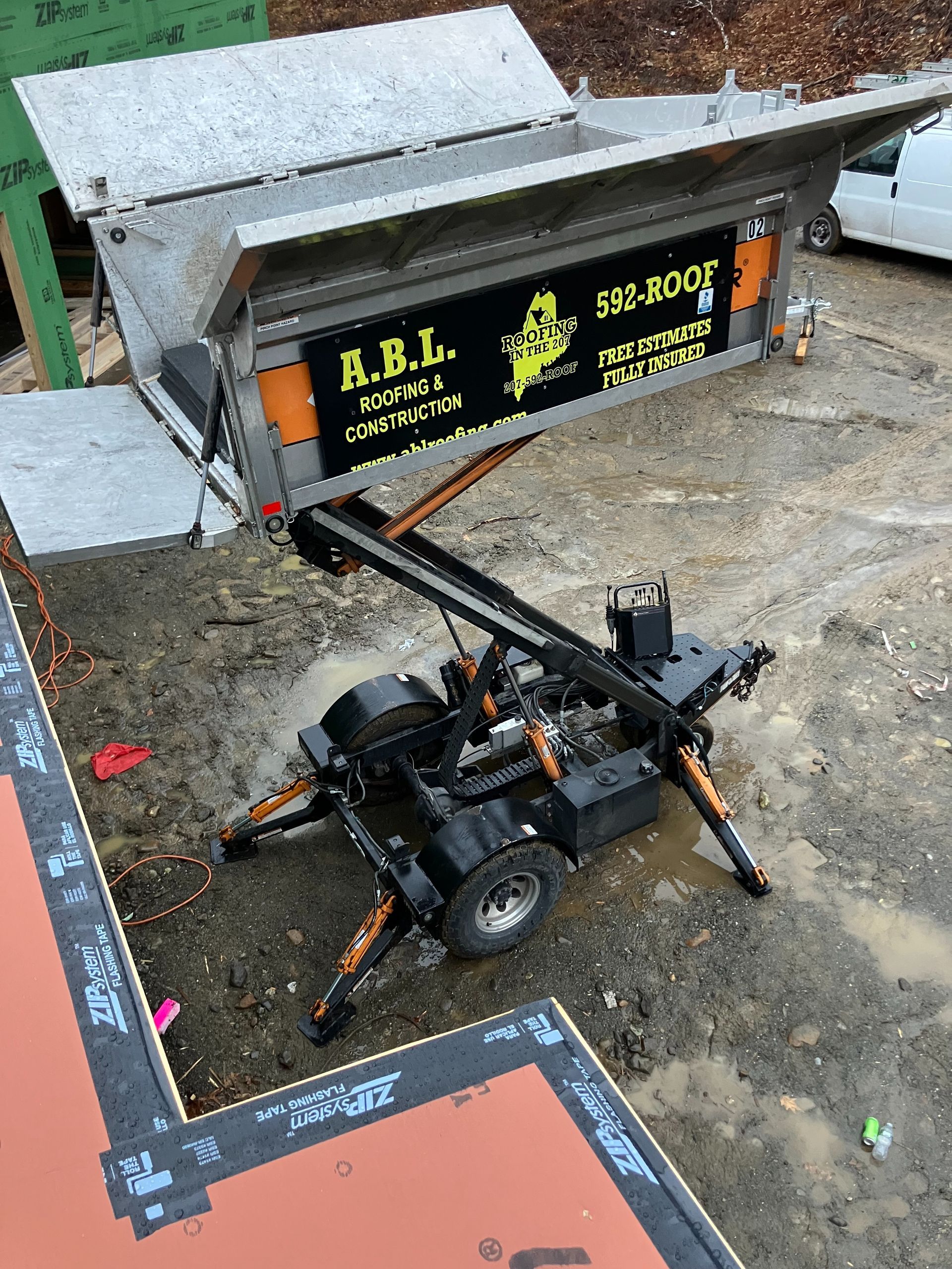 A machine is sitting in the dirt on a construction site.