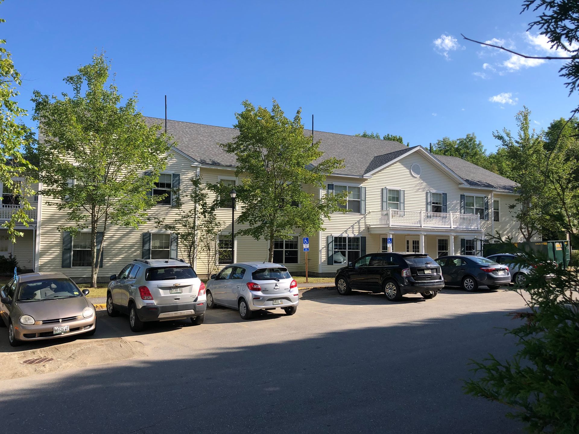 A building with cars parked in front of it