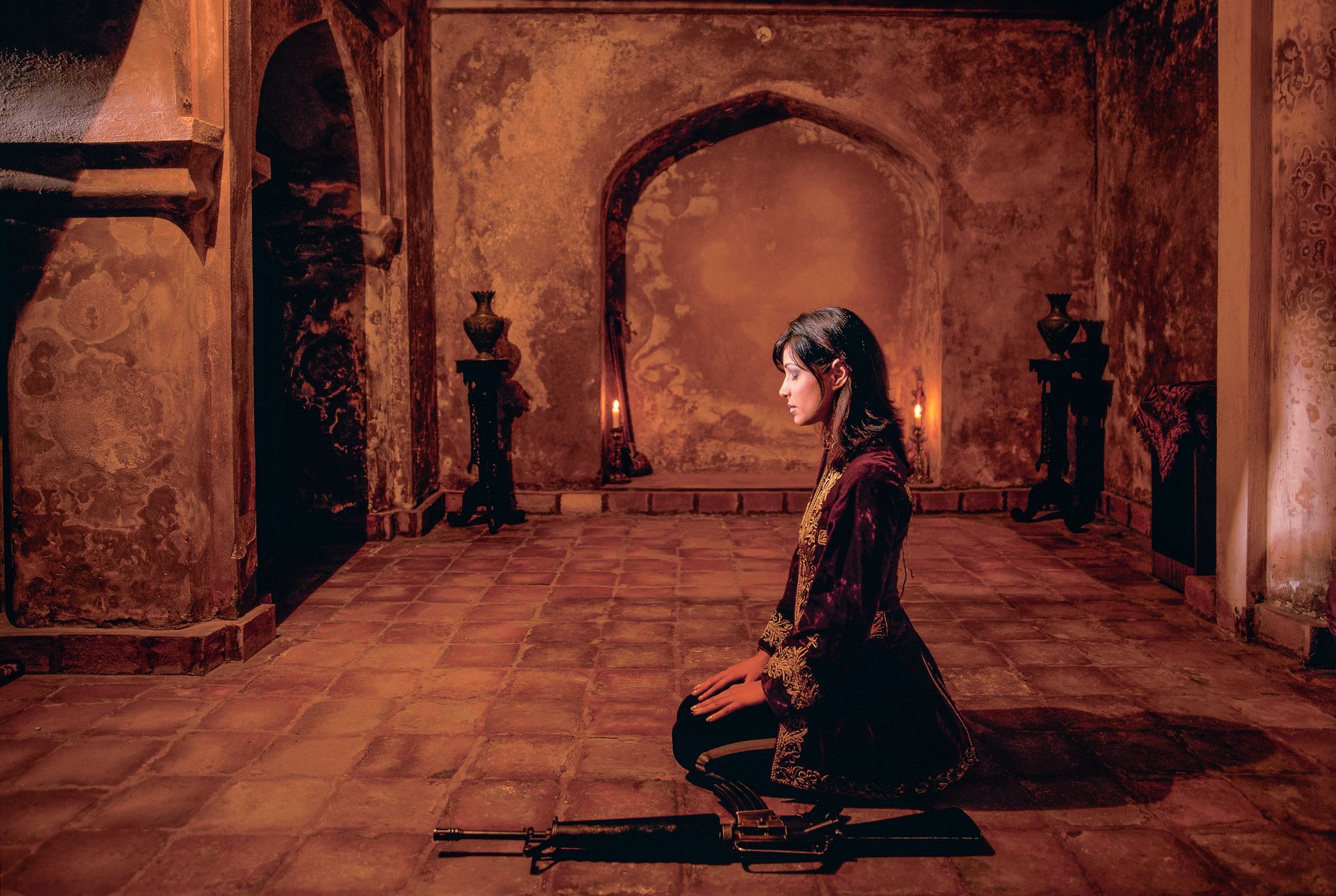 A  photo of a girl praying