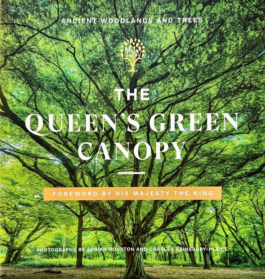 The queen 's green canopy is a book about ancient woodlands and trees.