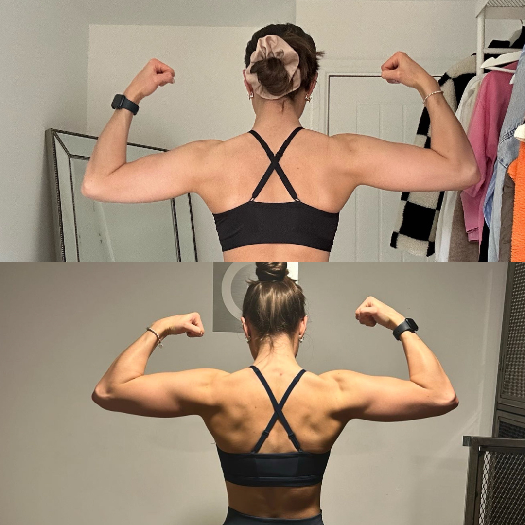 A woman is flexing her muscles in front of a mirror.