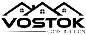 A black and white logo for a construction company called vostok construction.