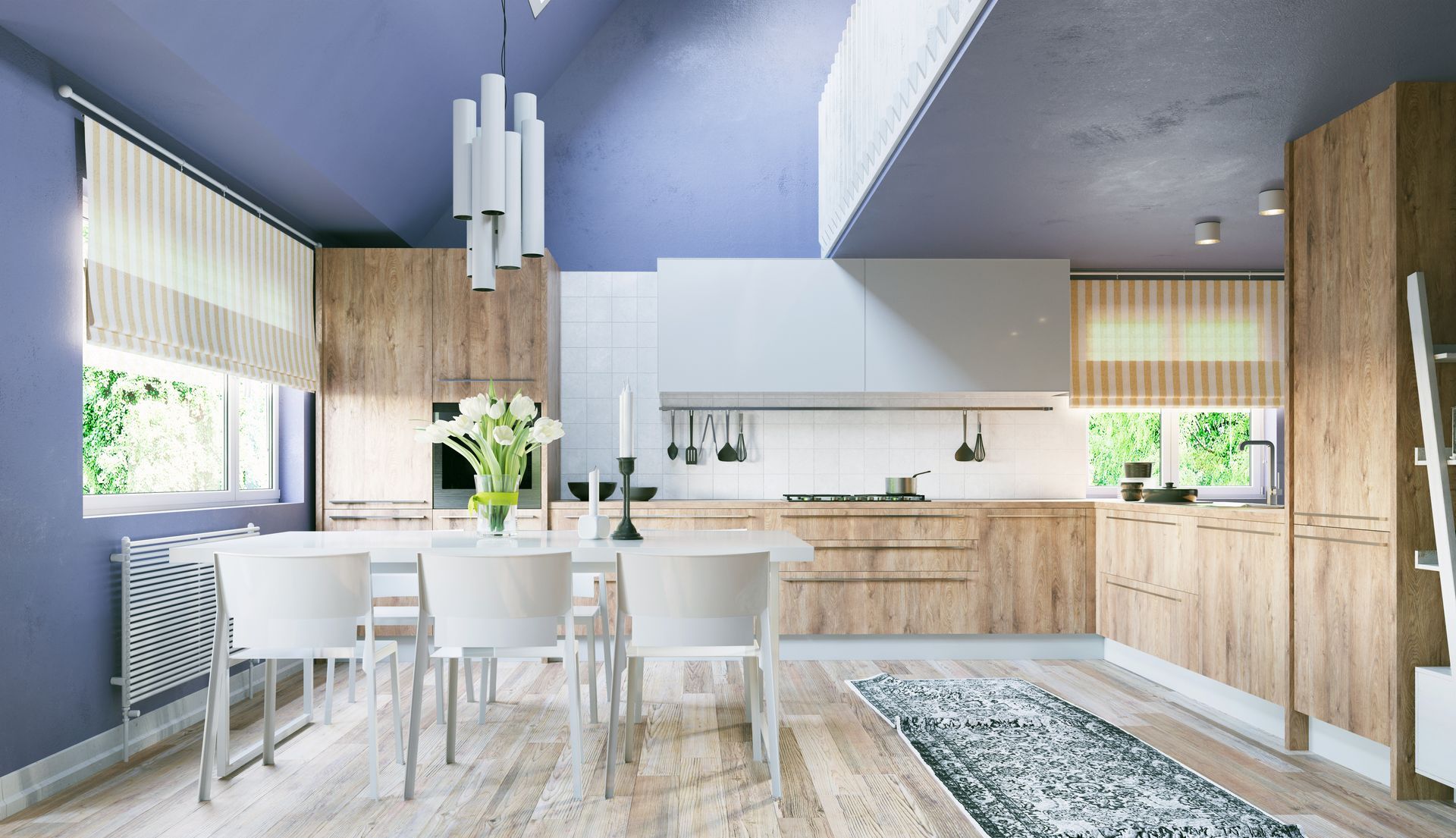 A beautiful blue kitchen with wooden countertops and cabinets