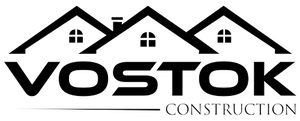 A black and white logo for a construction company called vostok construction.