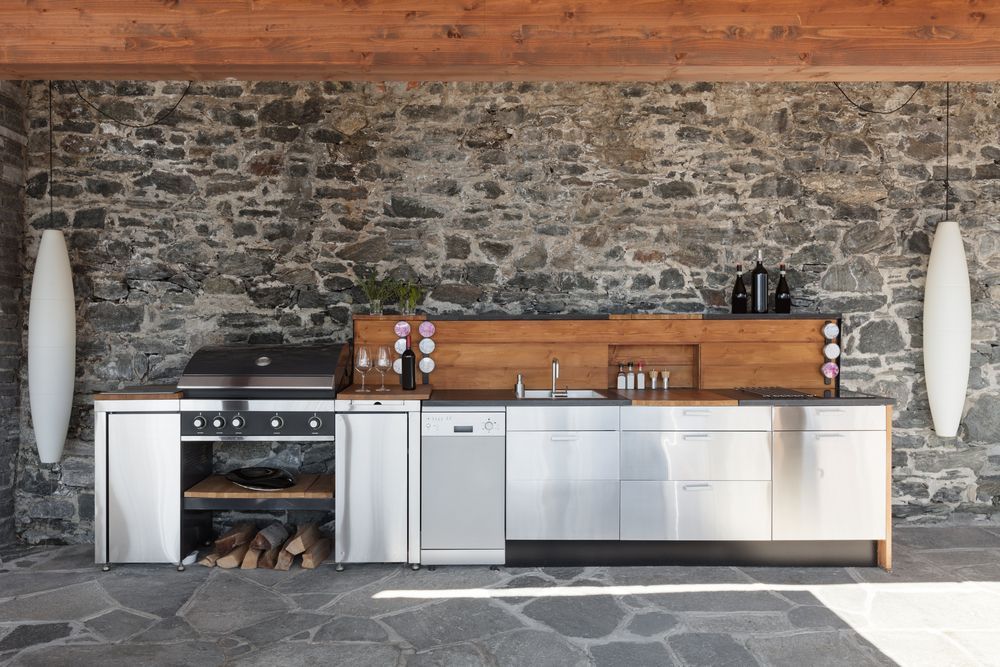 Outdoor Kitchen With Stainless Steel Appliances And A Wooden Countertop — South East Kitchens In Burleigh Heads, QLD