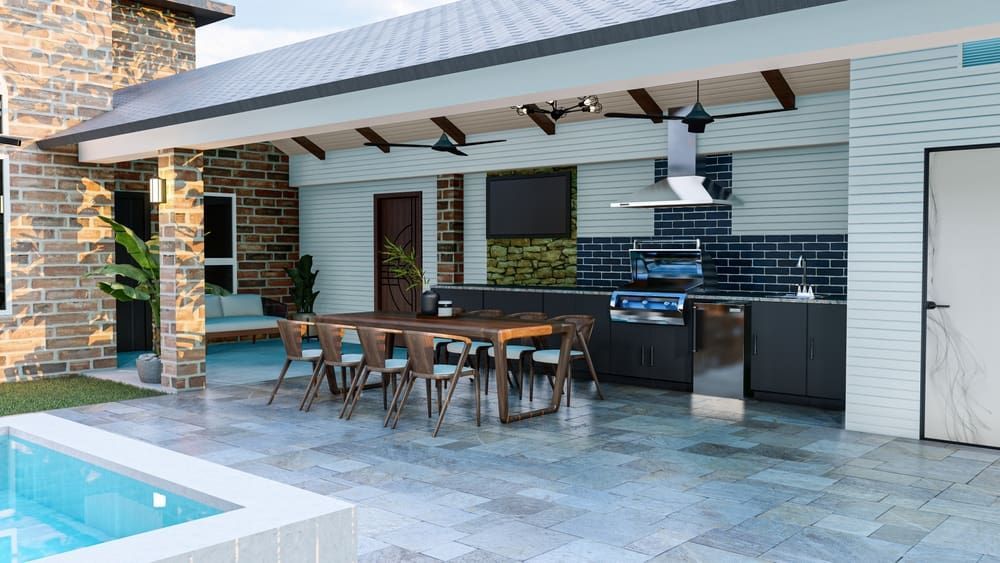 A Kitchen With A Table And Chairs Next To A Pool — South East Kitchens In Burleigh Heads, QLD