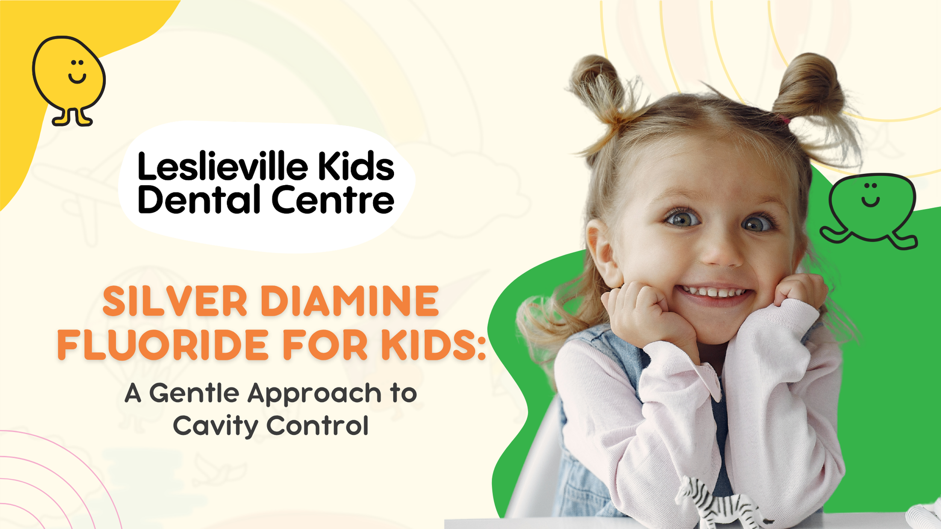 A little girl is smiling with her hands on her face.