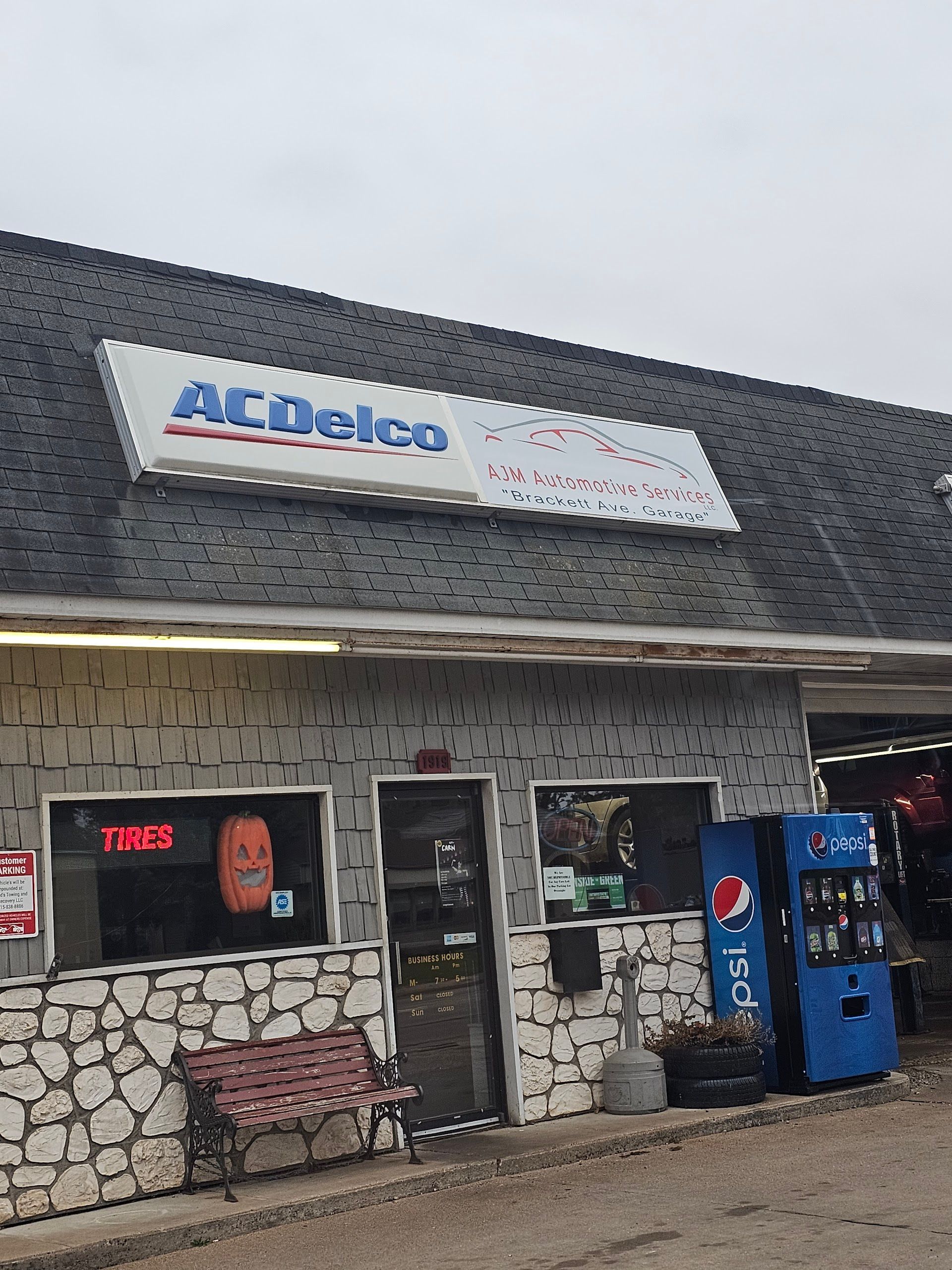 ACDelco auto parts store with a blue Pepsi vending machine  | AJM Automotive Services LLC