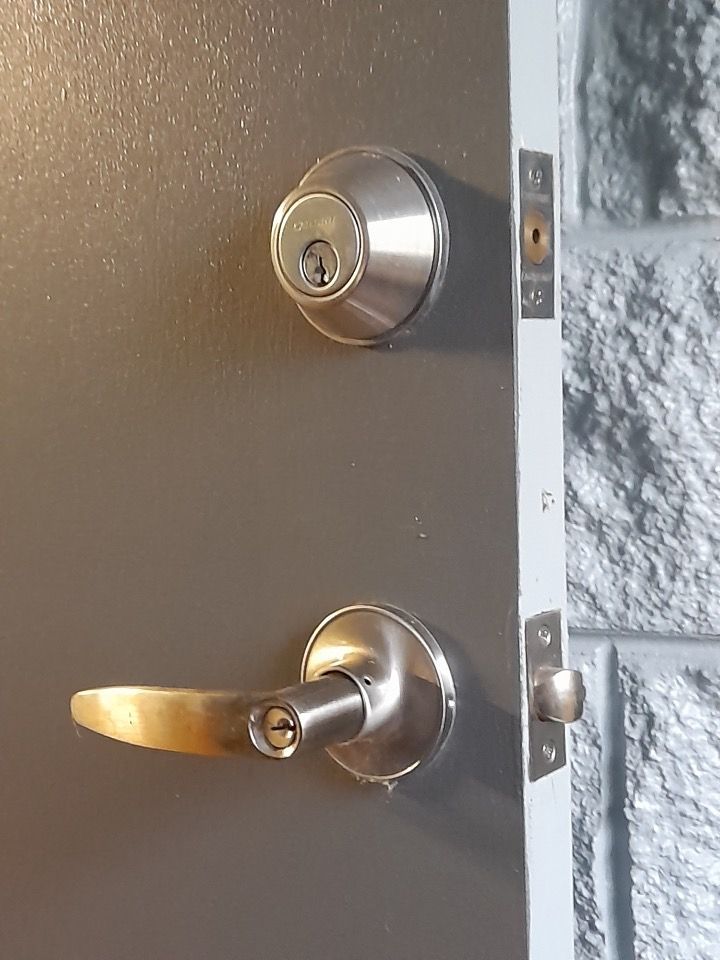 A Close Up Of A Door With A Handle And Lock — Cassowary Coast Locksmiths In East Feluga, QLD