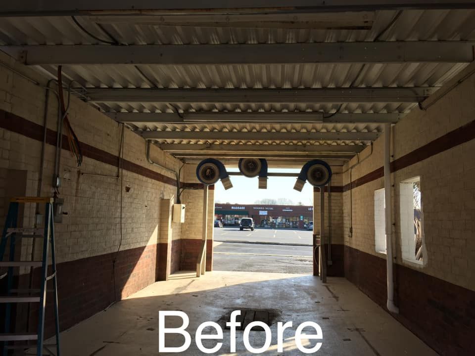 A picture of a car wash before being remodeled