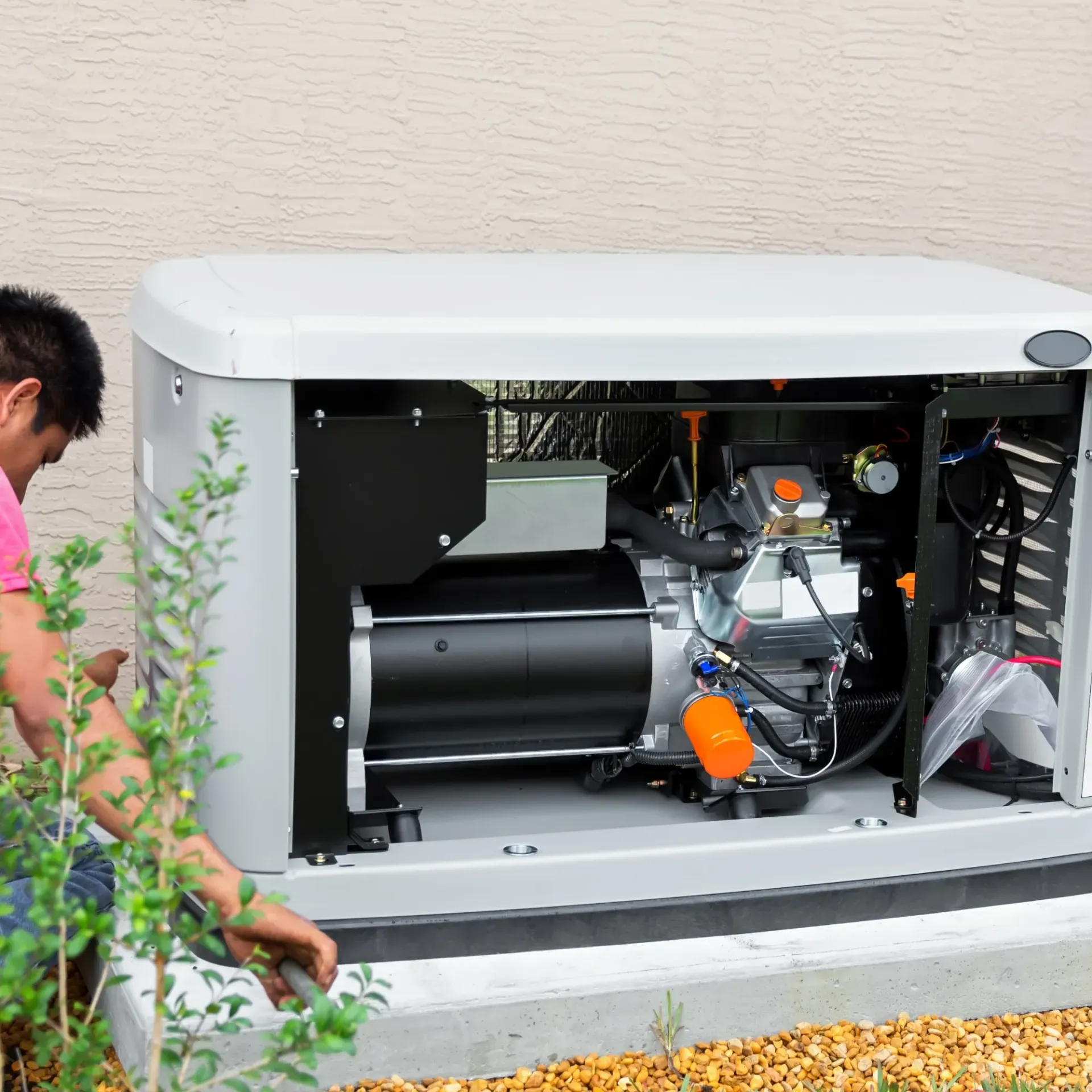 Horizon Electric USA - A man is working on a generator outside of a building