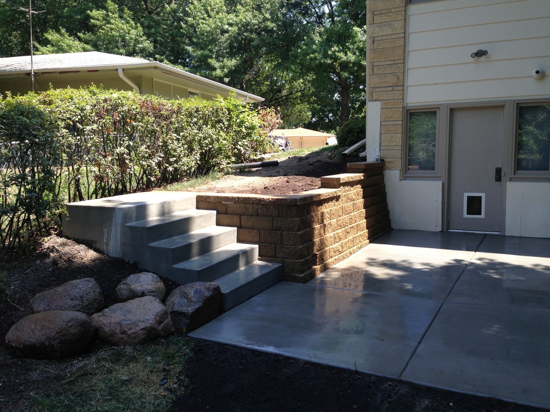 A house with stairs leading up to the front door