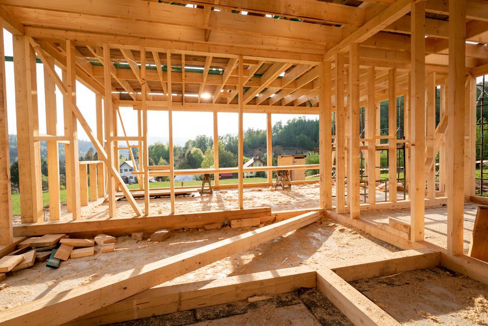 Wood-framed House Under Construction With Exposed Beams — C K Carpentry in Byron Bay, NSW