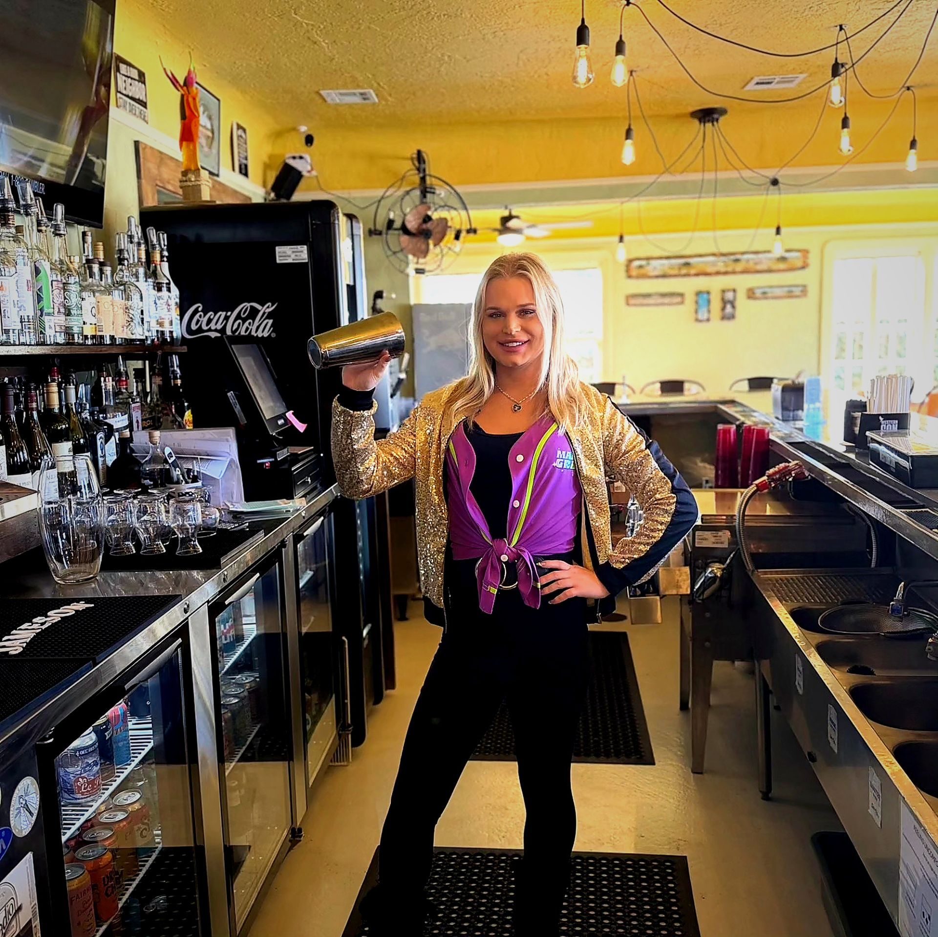 Bartender shaking a craft cocktail behind the bar. Pub, Restaurant, beer