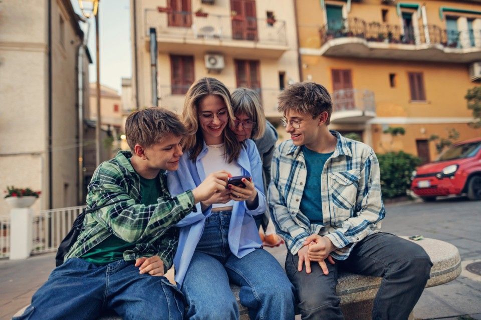 Young people with a mobile phone