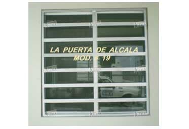 PORTONES AMERICANOS Y DE HERRERÍA AUTOMÁTICOS LA PUERTA DE ALCALÁ - colocación de protecciones para ventanas