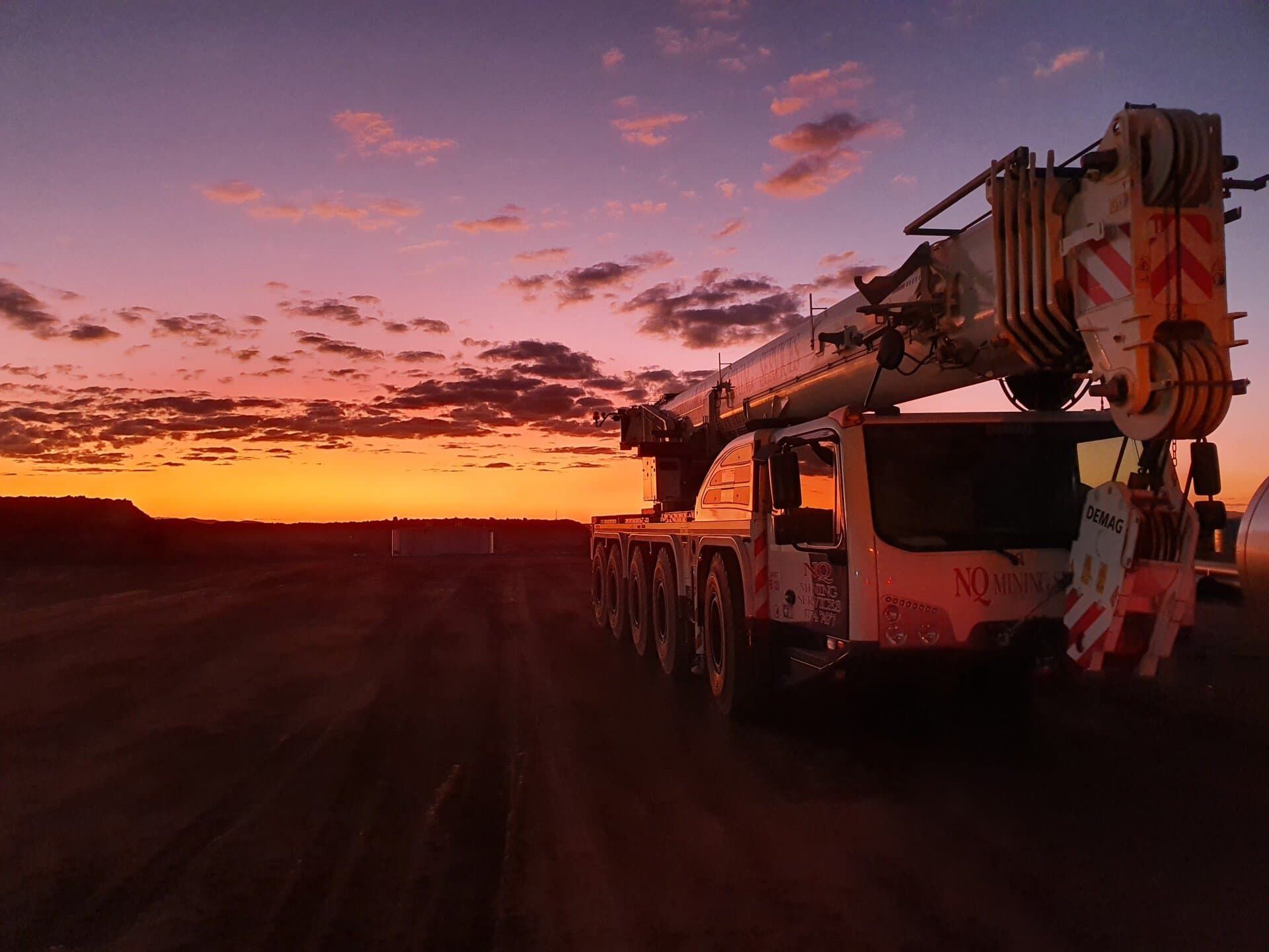 Crane with a Beautiful Sunset on the Background — Crane Hire in Bohle, QLD