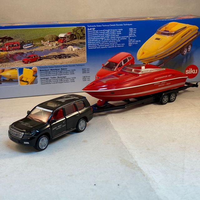 Siku 2543 - Voiture Toyota Landcruiser Avec Bateau à Moteur Flottant - Modèle 1:55, Métal/Plastique