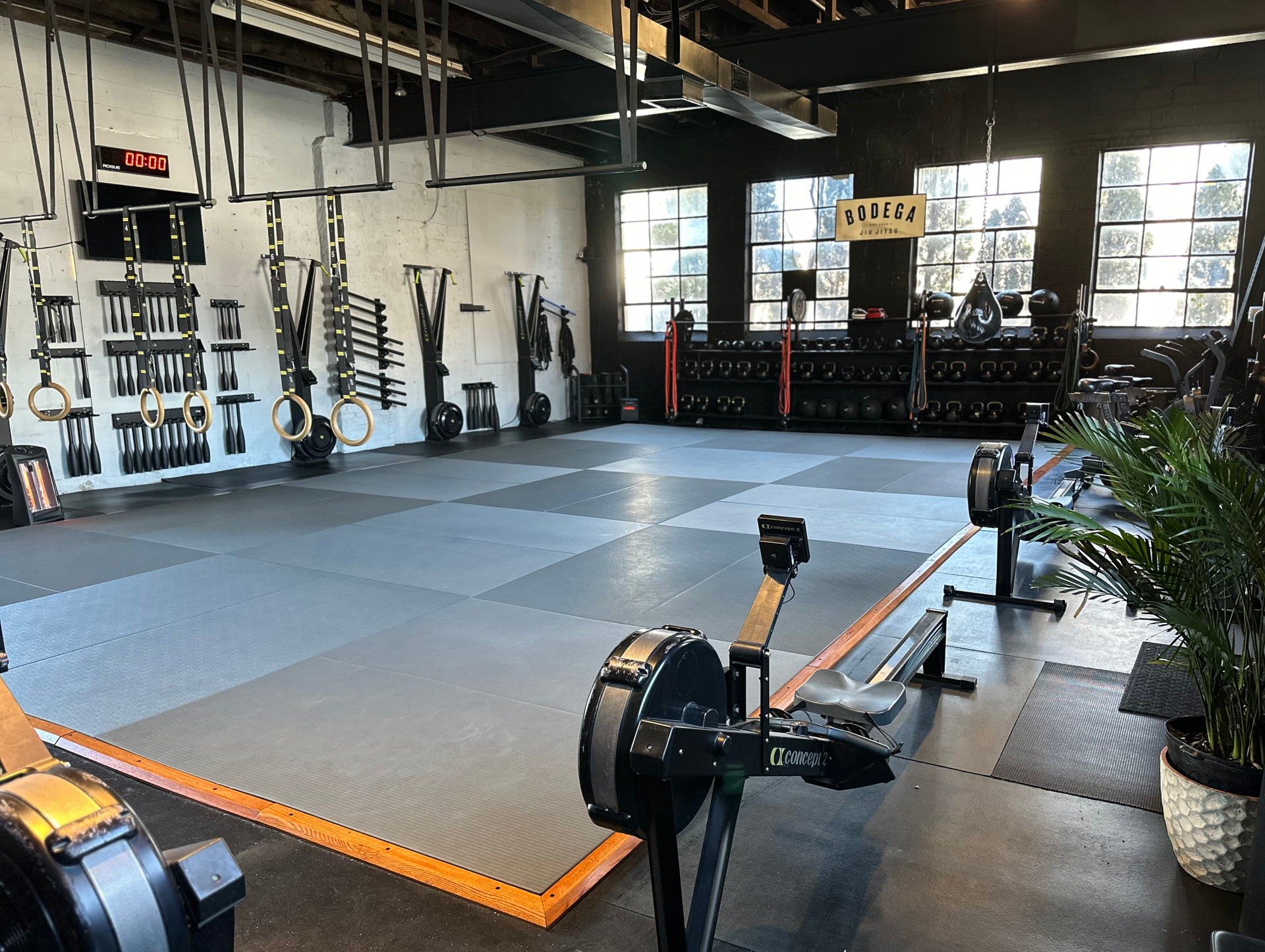 Adults practicing grappling techniques at Bodega Jiu-Jitsu in Maplewood, NJ, building calm everyday confidence.