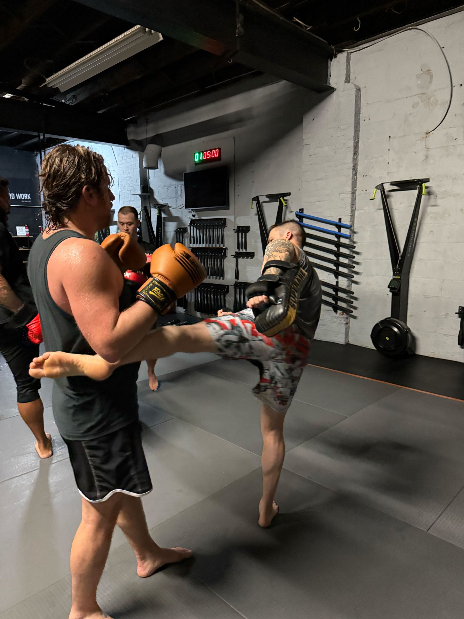 Adults practicing grappling drills at Bodega Jiu-Jitsu in Maplewood, NJ, building fitness and confidence.