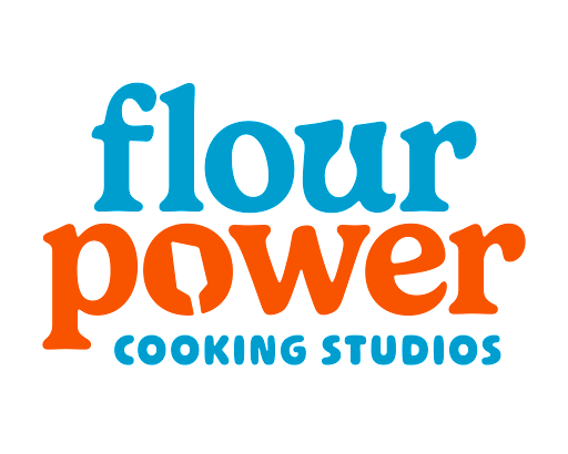 A blue and orange logo for flour power cooking studios