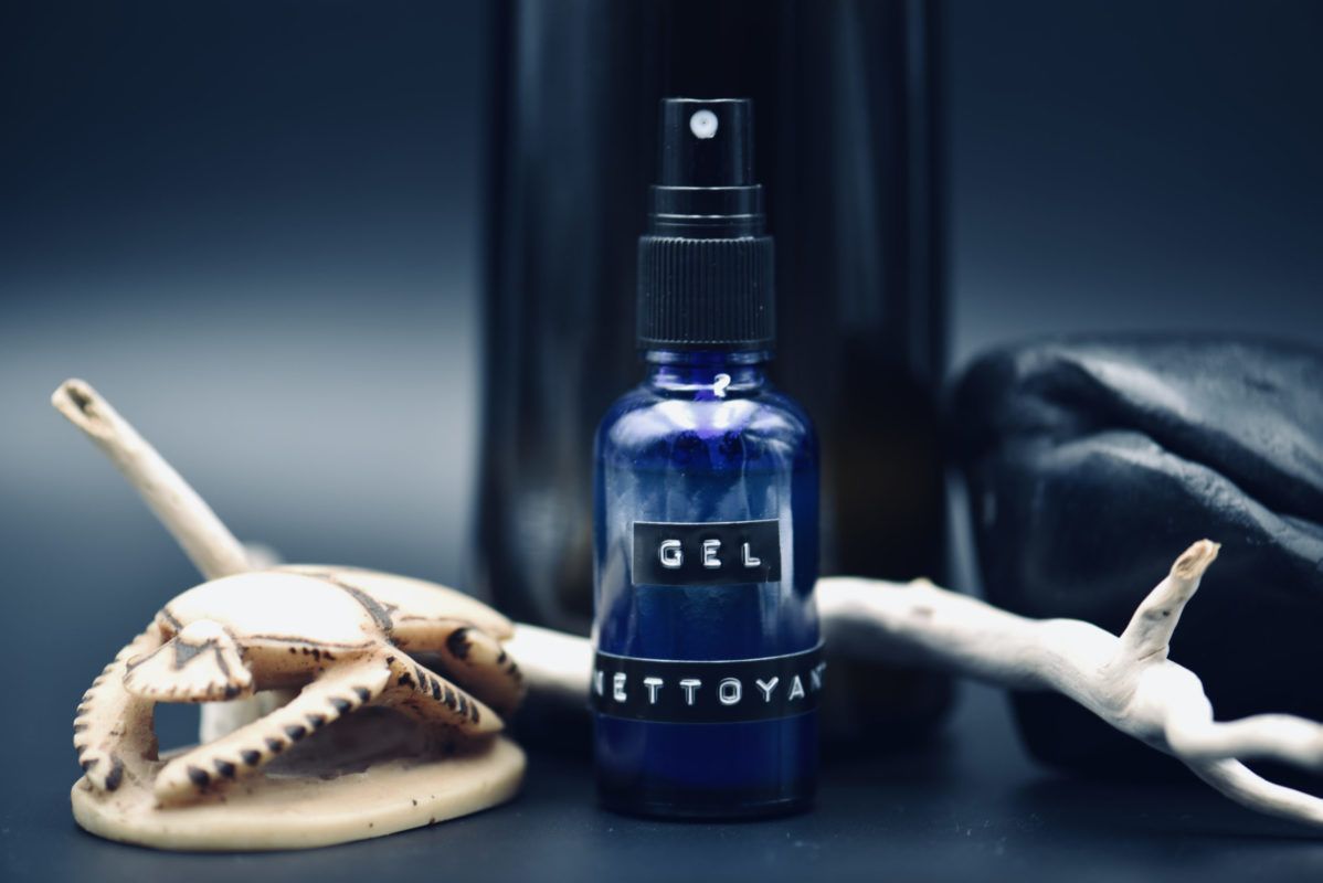 Blue spray bottle labeled