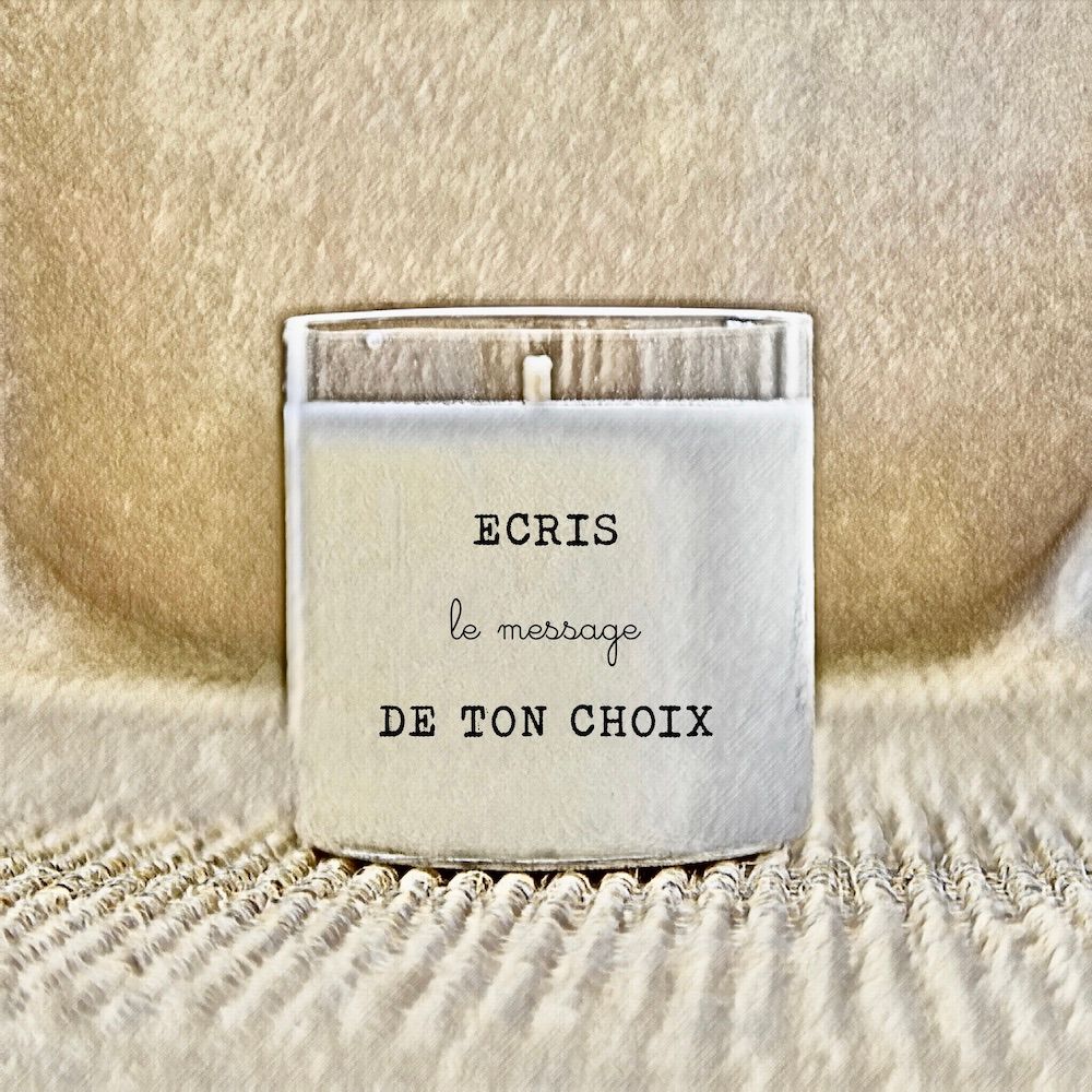 Bougie dans un pot en verre avec texte