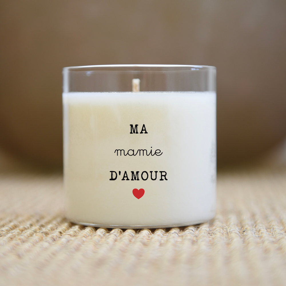 Bougie dans un pot en verre avec texte