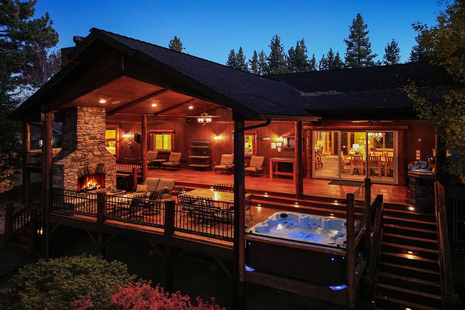 A large house with a hot tub in front of it