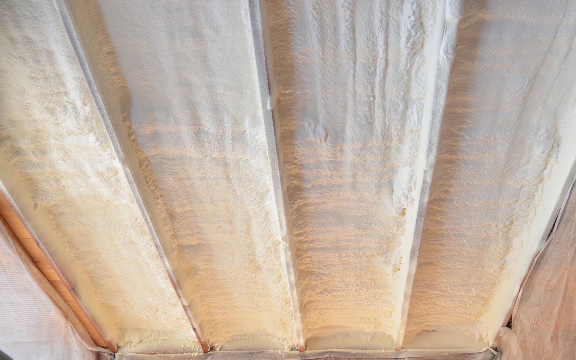 Roof with spray foam insulation showing closed cell spray insulation services in Madison, WI by Duerst Insulation Technicians