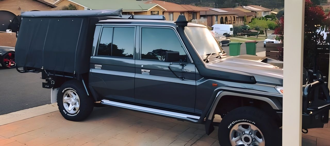 A Truck With a Canopy on Top of It is Parked in a Driveway — Diamond Tints In Phillip, ACT