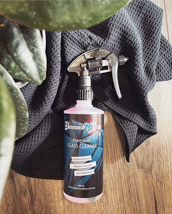 Premium Glass Cleaner with Cloth in the Background — Diamond Tints in Phillip, ACT