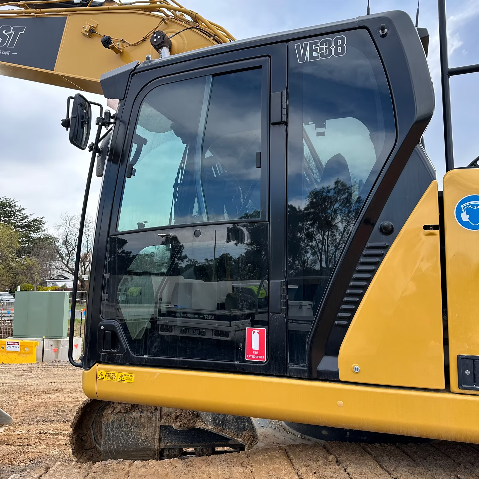 A Yellow bulldozer with tinted windows — Diamond Tints In Phillip, ACT