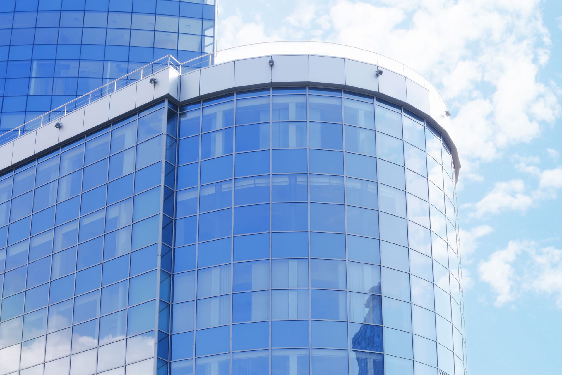 A Tall Building With a Lot of Windows — Diamond Tints In Goulburn, ACT