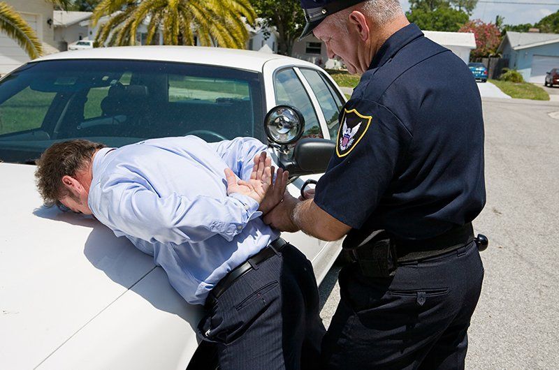 Police Arresting Drunk Driver — Eau Claire, WI — Cohen Law Offices