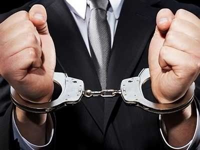 Business Man With Handcuff — Eau Claire, WI — Cohen Law Offices