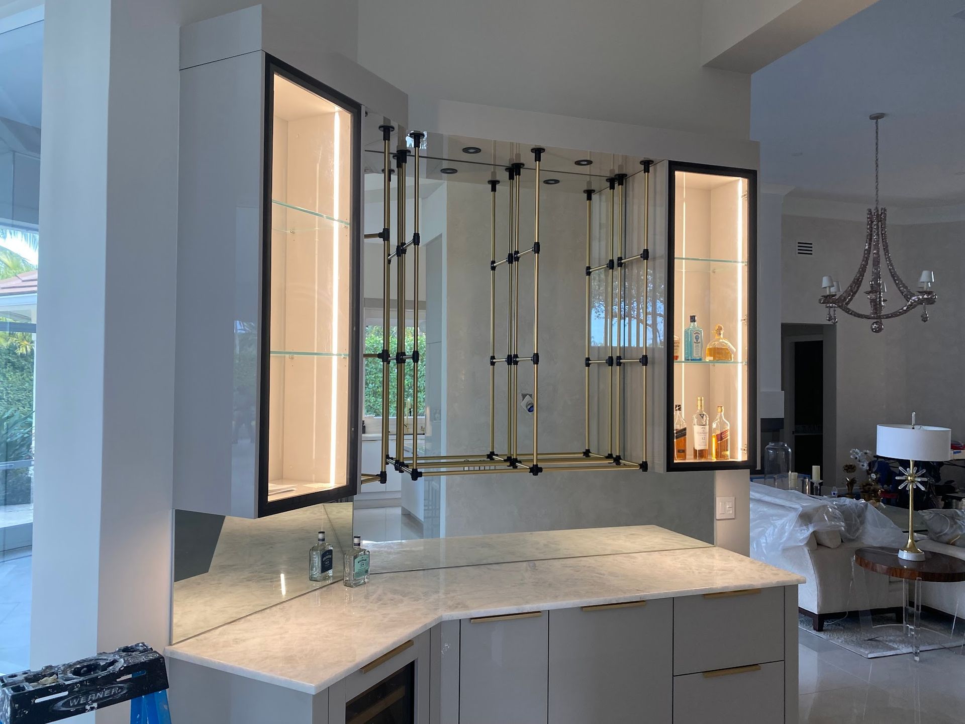 There is a bar in the middle of the room.